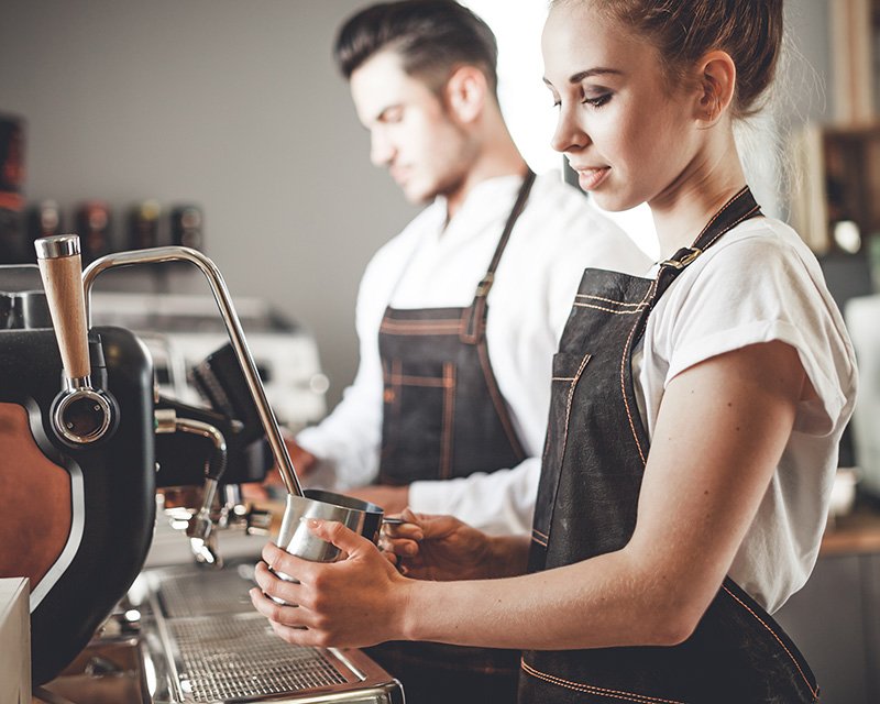 Barista crafting espresso